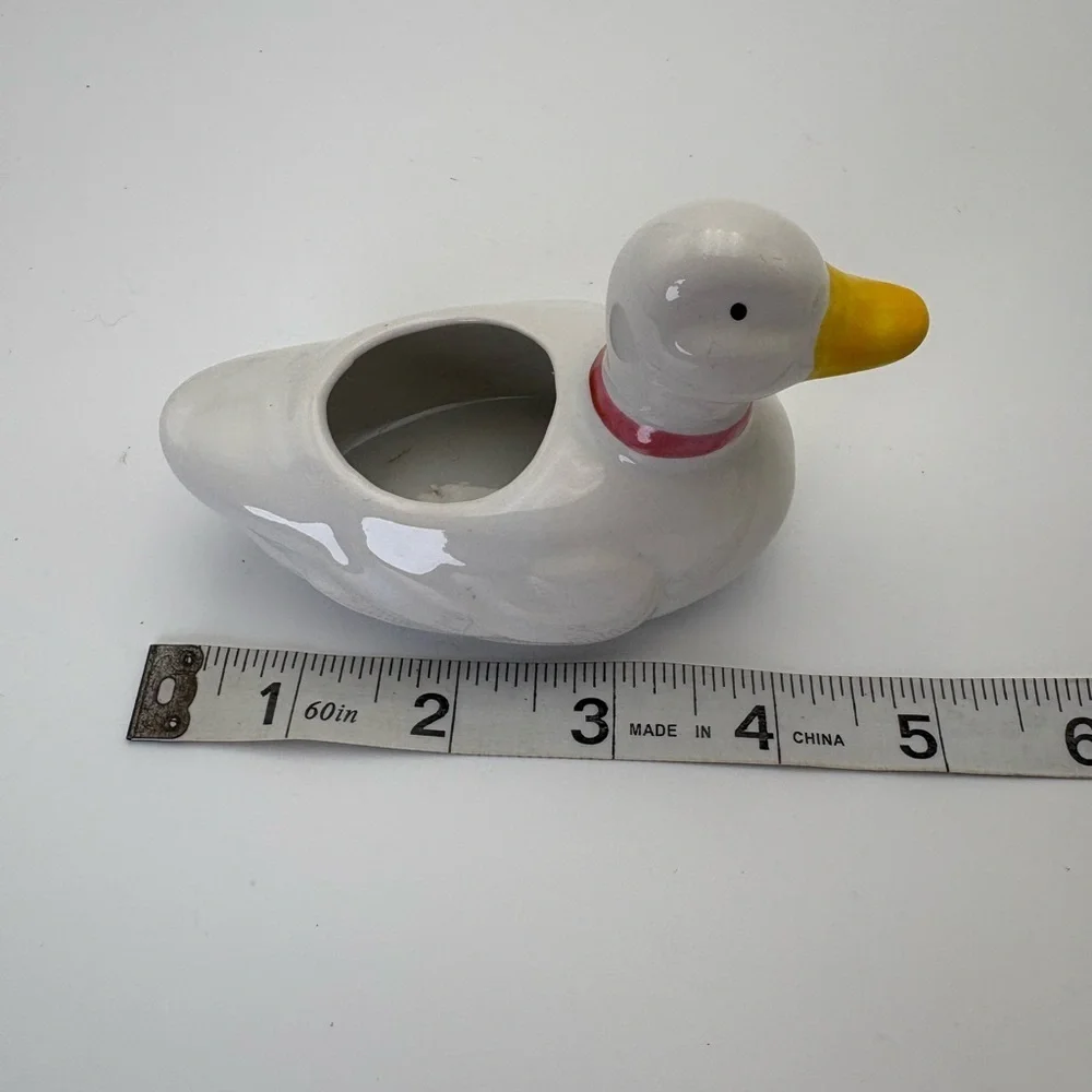 Charming White Duck Planter with Red Bow